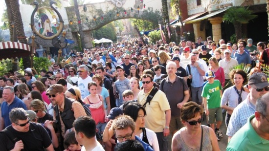 Actual crowds rushing into the Wizarding World of Harry Potter.