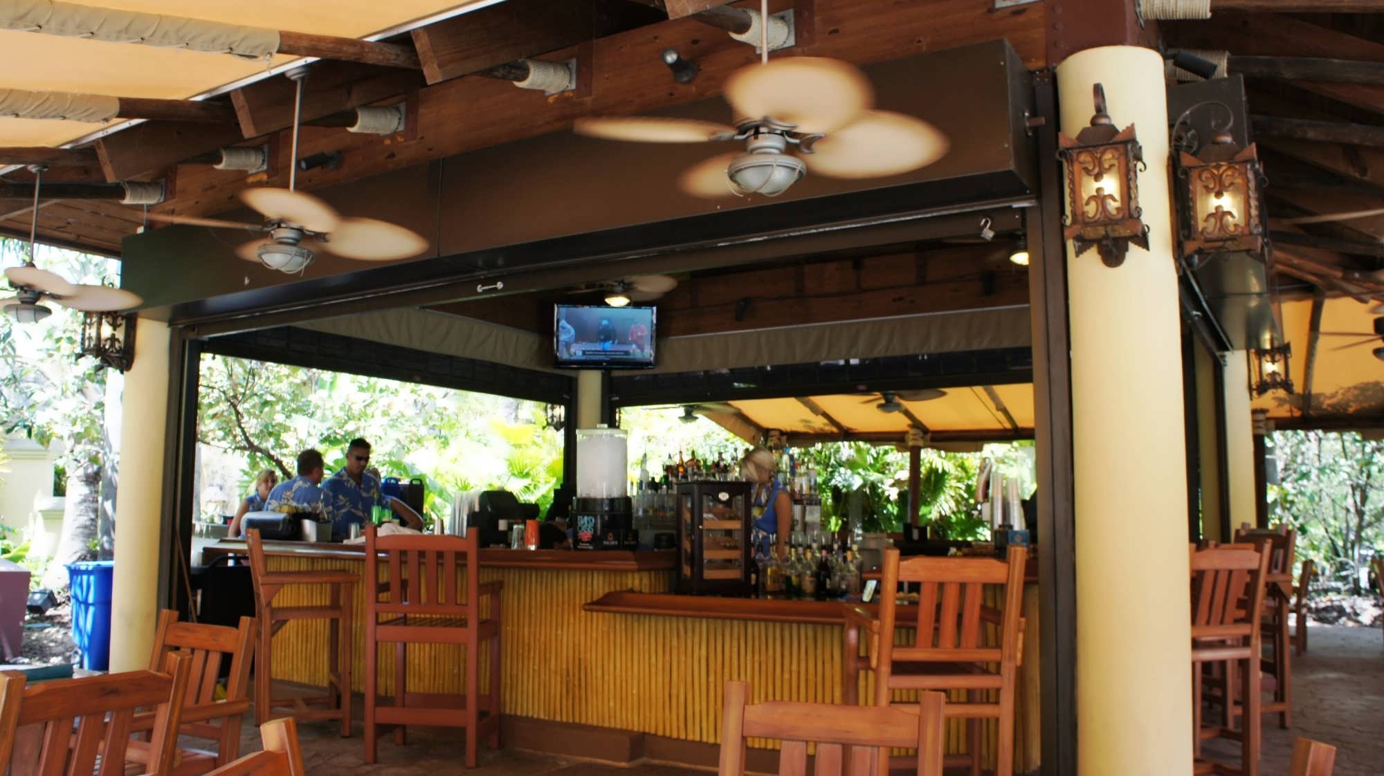 Ceiling fans cool of guests of the Bula Bar & Grille at Royal Pacific Resort