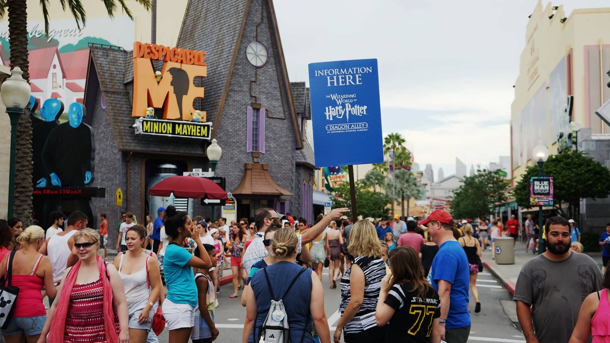 Team Members assisting with Diagon Alley directions