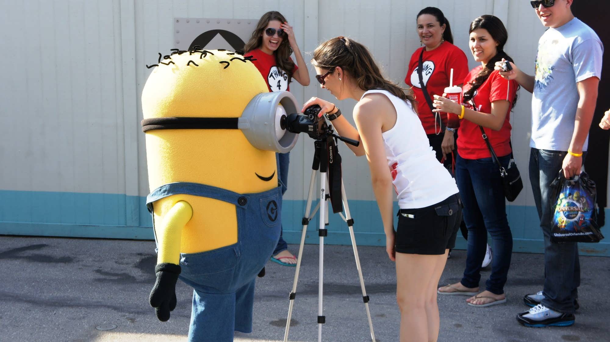 A minion from Despicable Me greets a guest