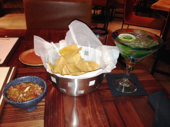 Chips, salsa, and margarita. 