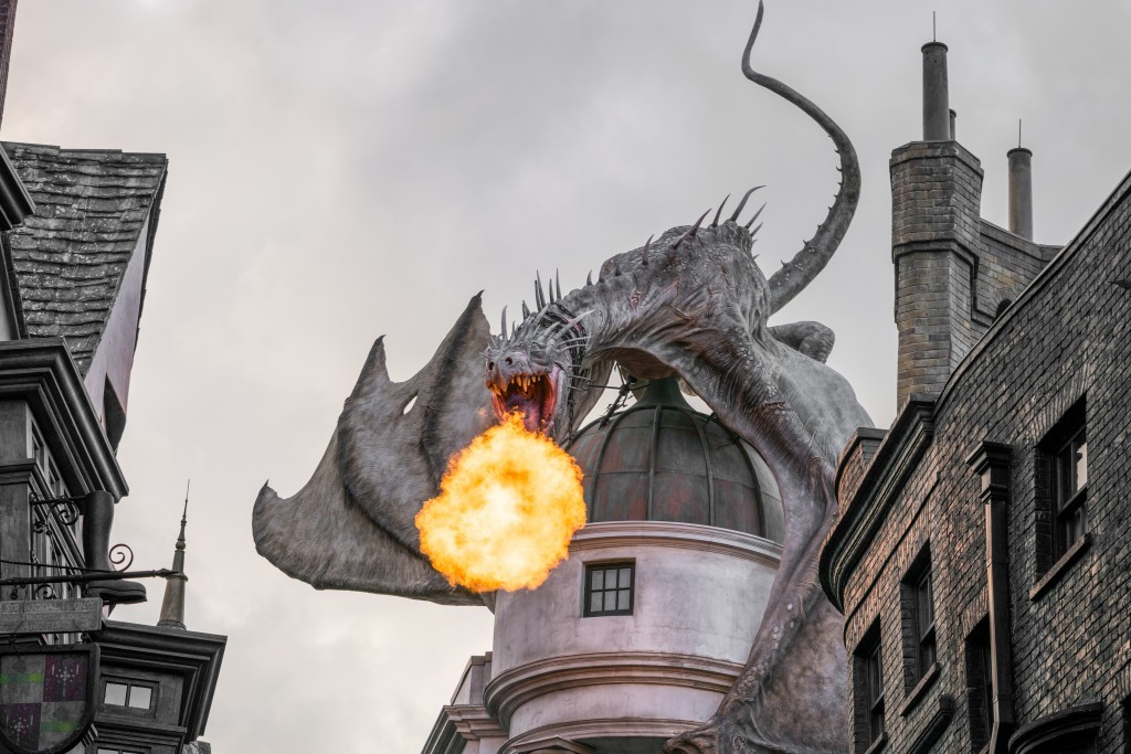 Most photos are a bust when it comes to a cloudy sky. In this case, the clouds seem to add the perfect mood to an already angry-looking dragon showing off her fire-breathing.