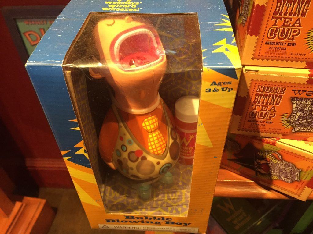 Small 8.5 inch tall plastic toy that burps and blow bubbles