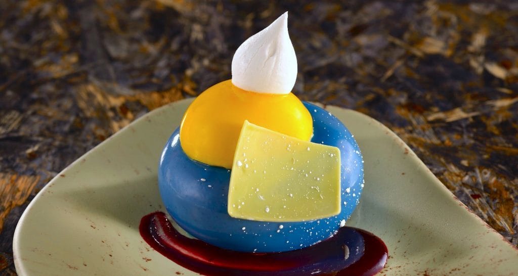 Na’vi blueberry cheesecake served with passion fruit curd
