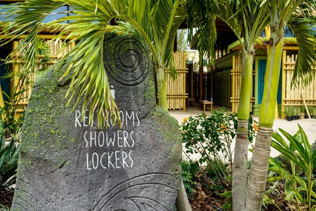 Restrooms, showers, lockers sign at Universal's Volcano Bay