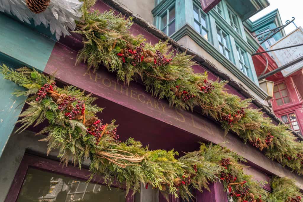 The Apothecary decorated for Christmas in The Wizarding World of Harry Potter