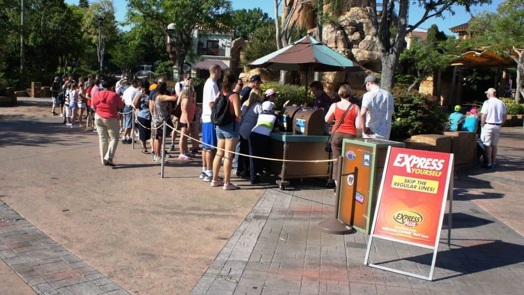 The Express Pass kiosks outside Universal's Islands of Adventure gates attract long lines.