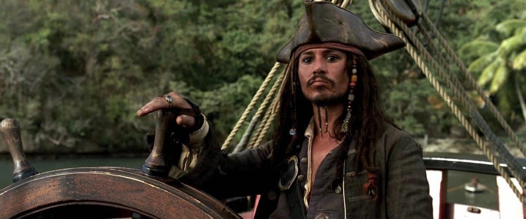 Jack Sparrow at the wheel of a ship
