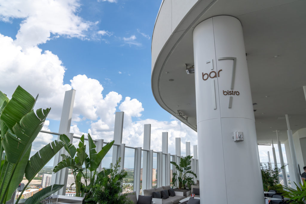 Pillar with sign for Bar 17 Bistro on the rooftop of the Aventura hotel