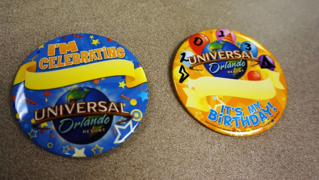 Birthday and "I'm celebrating" buttons at Universal Orlando Resort