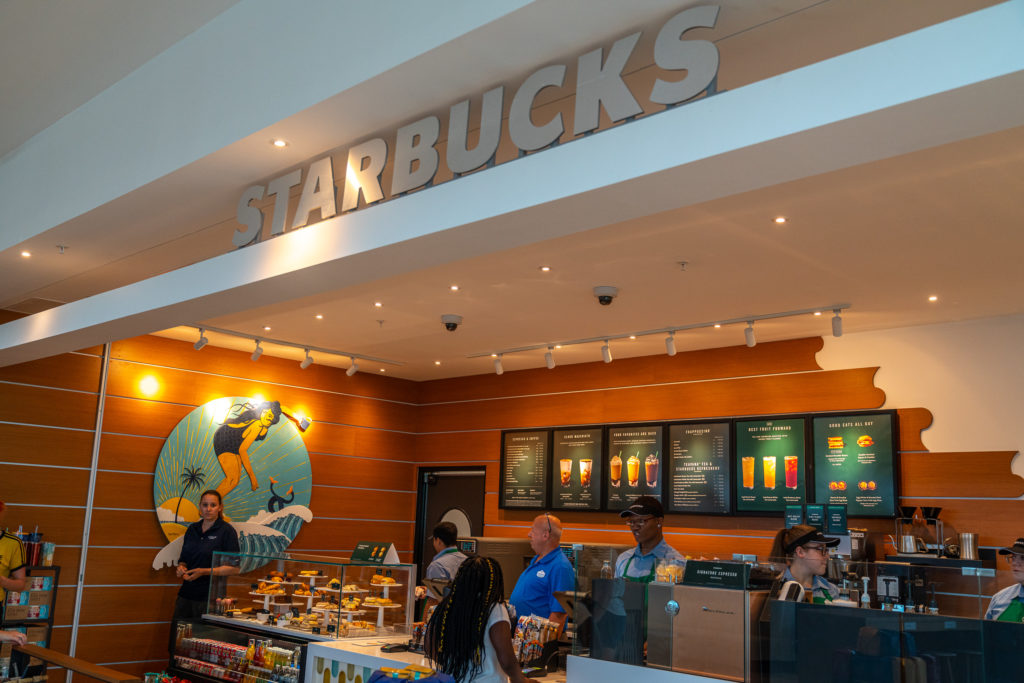 Surfing images decorate the wall at the Surfside Inn and Suites Starbucks