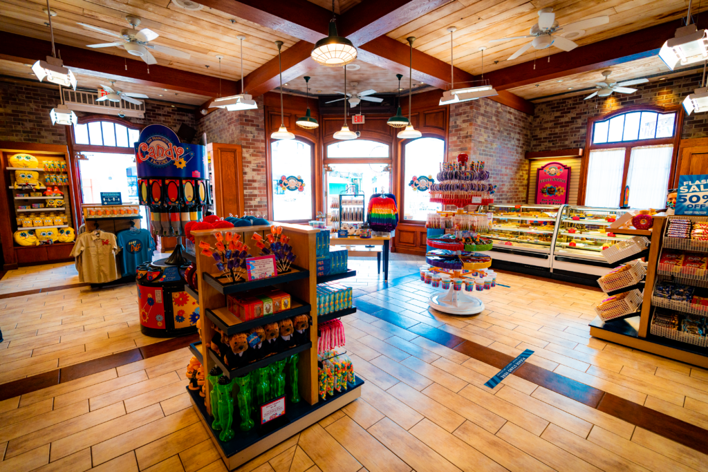 Interior of San Francisco Candy Factory has brightly-colored candy displays and a pastry counter