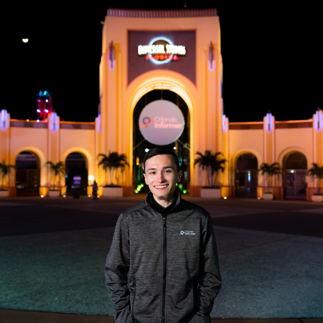 Headshot of Taylor in front of Universal Studios Florida arches with Orlando Informer medallion
