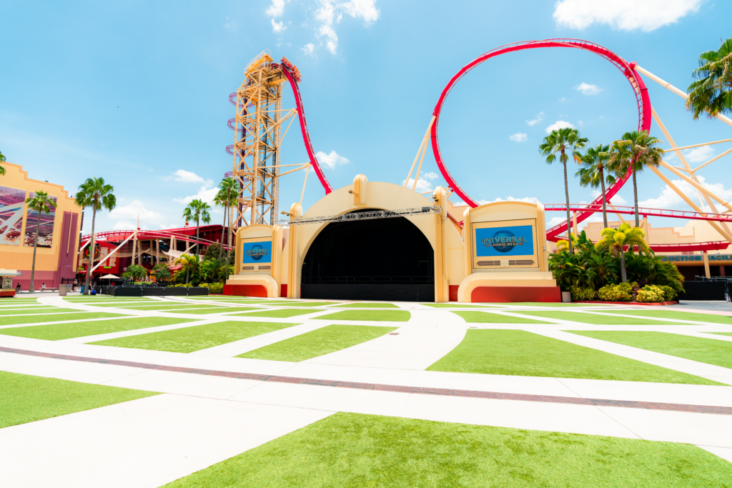 The grassy area in front of Universal Music Plaza is the perfect place to take in a show