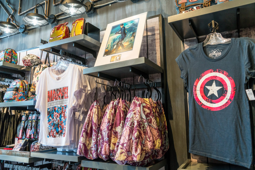 Clothes, handbags, and artist prints are available for purchase at the Boutique in Marvel Super Hero Island