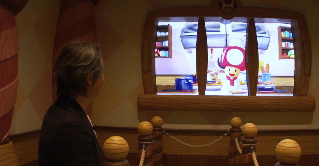 Chef Toad greets you at Kinopio's Cafe in Super Nintendo World