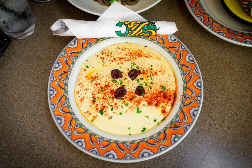 A bowl of hummus at Confisco Grille in Islands of Adventure