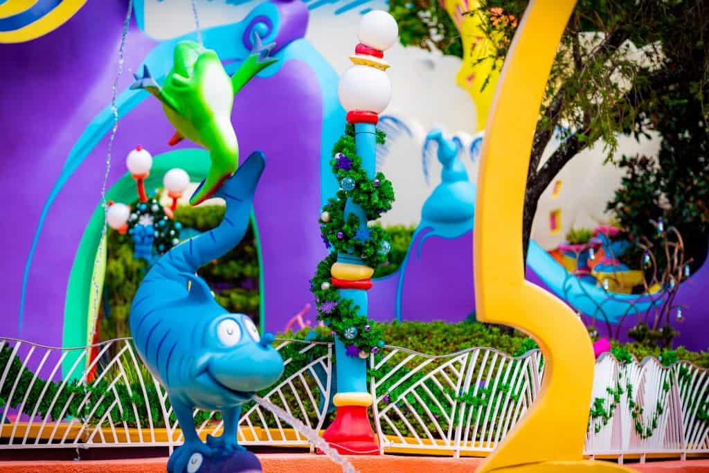 Garland lining the railings and lampposts of Seuss Landing