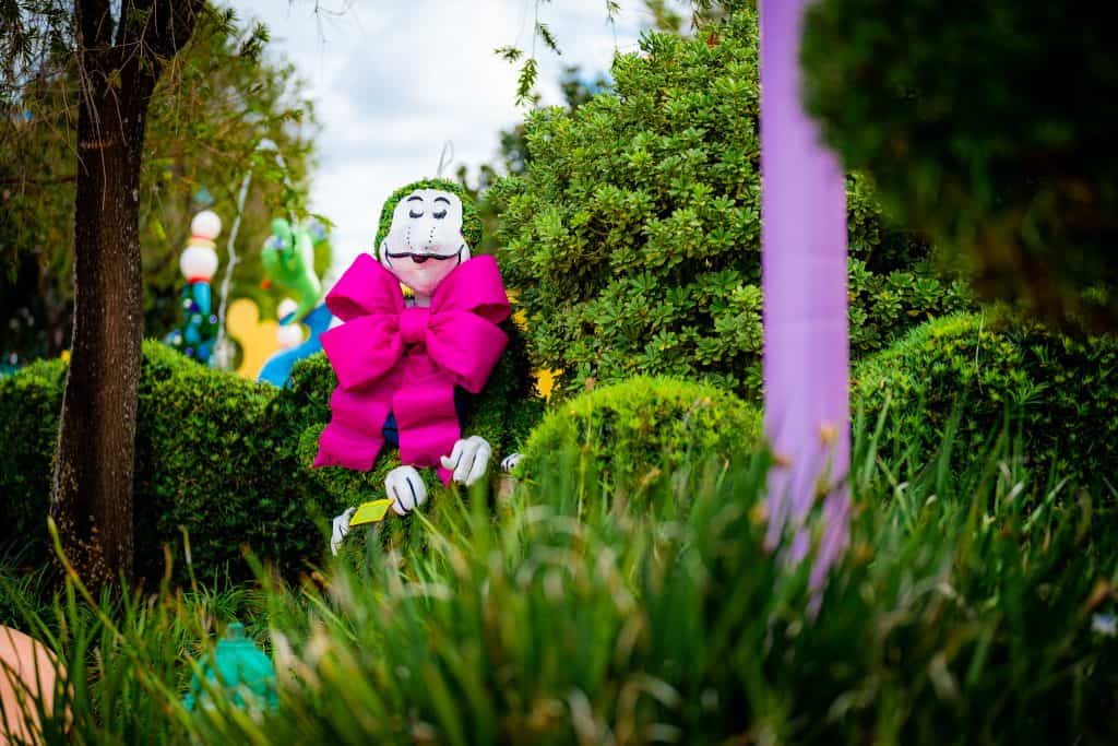 Topiary inside Seuss Landing decorated with a bow