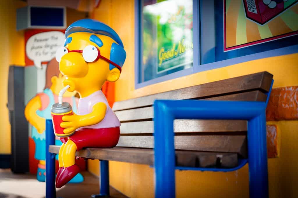 Milhouse slurps a Buzz Cola outside the Kwik-E-Mart in Springfield: Home of the Simpsons, Universal Studios Florida