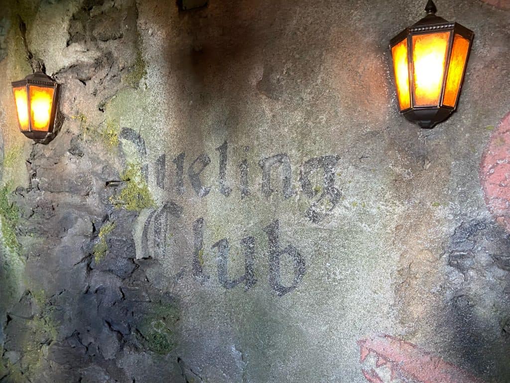 Dueling Club sign inside the queue of Hagrid’s Magical Creatures Motorbike Adventure