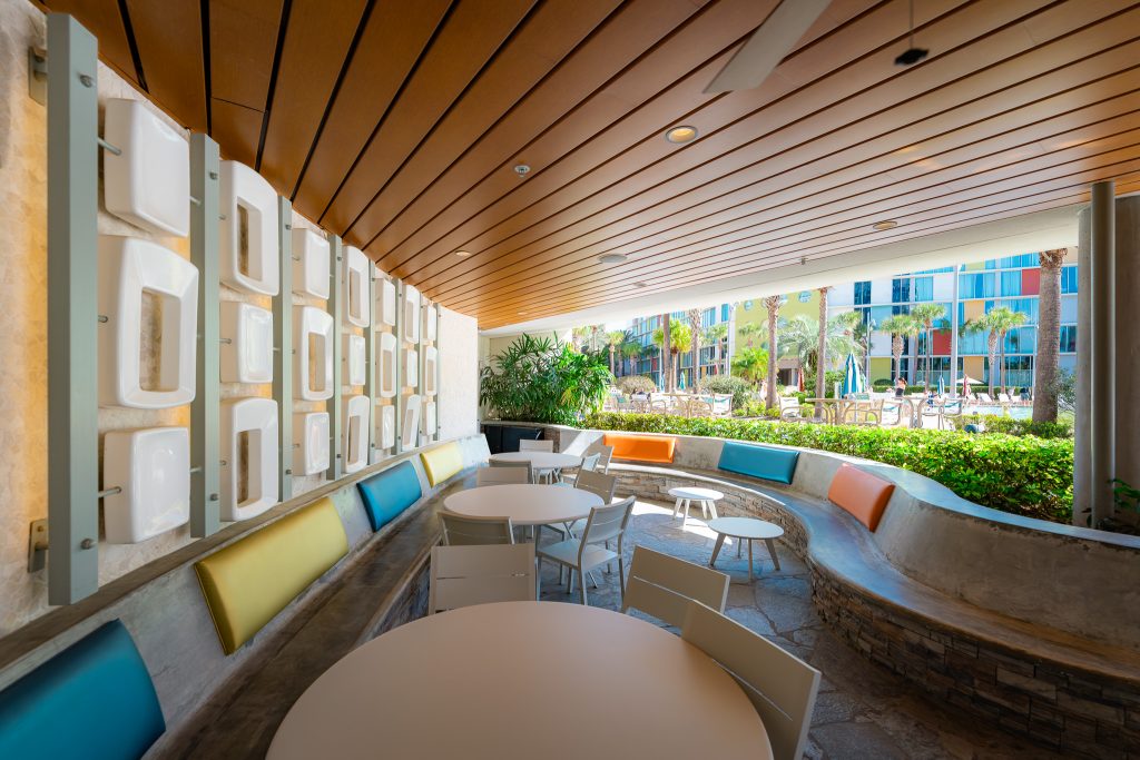 Seating area at The Hideaway Bar & Grill, a poolside restaurant