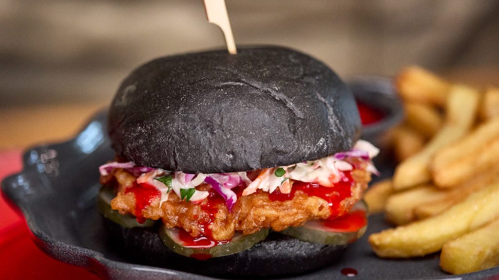 Blood Orange Chicken Sandwich at Universal Epic Universe's Das Stakehaus