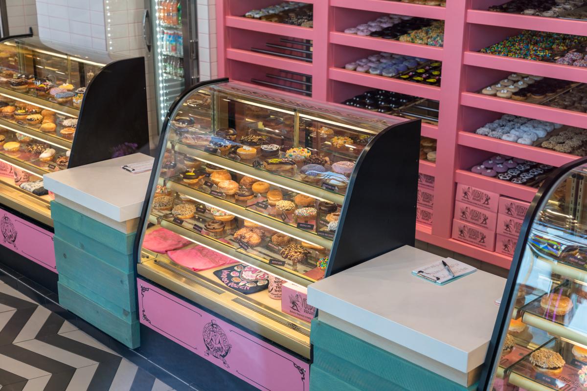 Doughnuts behind the counter at Voodoo Doughnuts